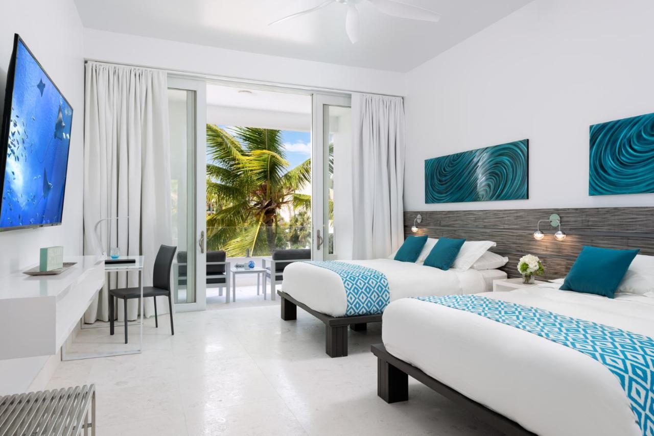 Zenza Boutique Hotel Turtle Cove Exterior photo