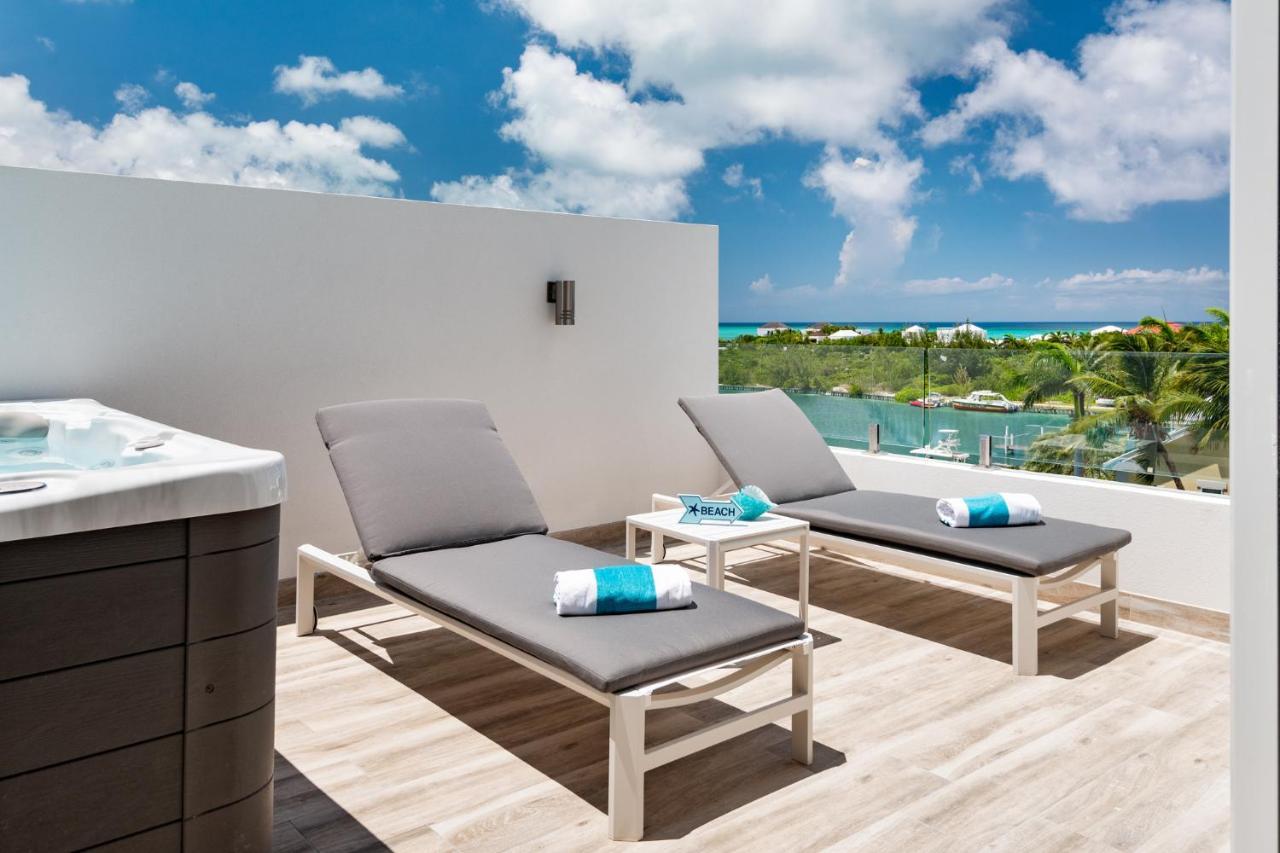 Zenza Boutique Hotel Turtle Cove Exterior photo